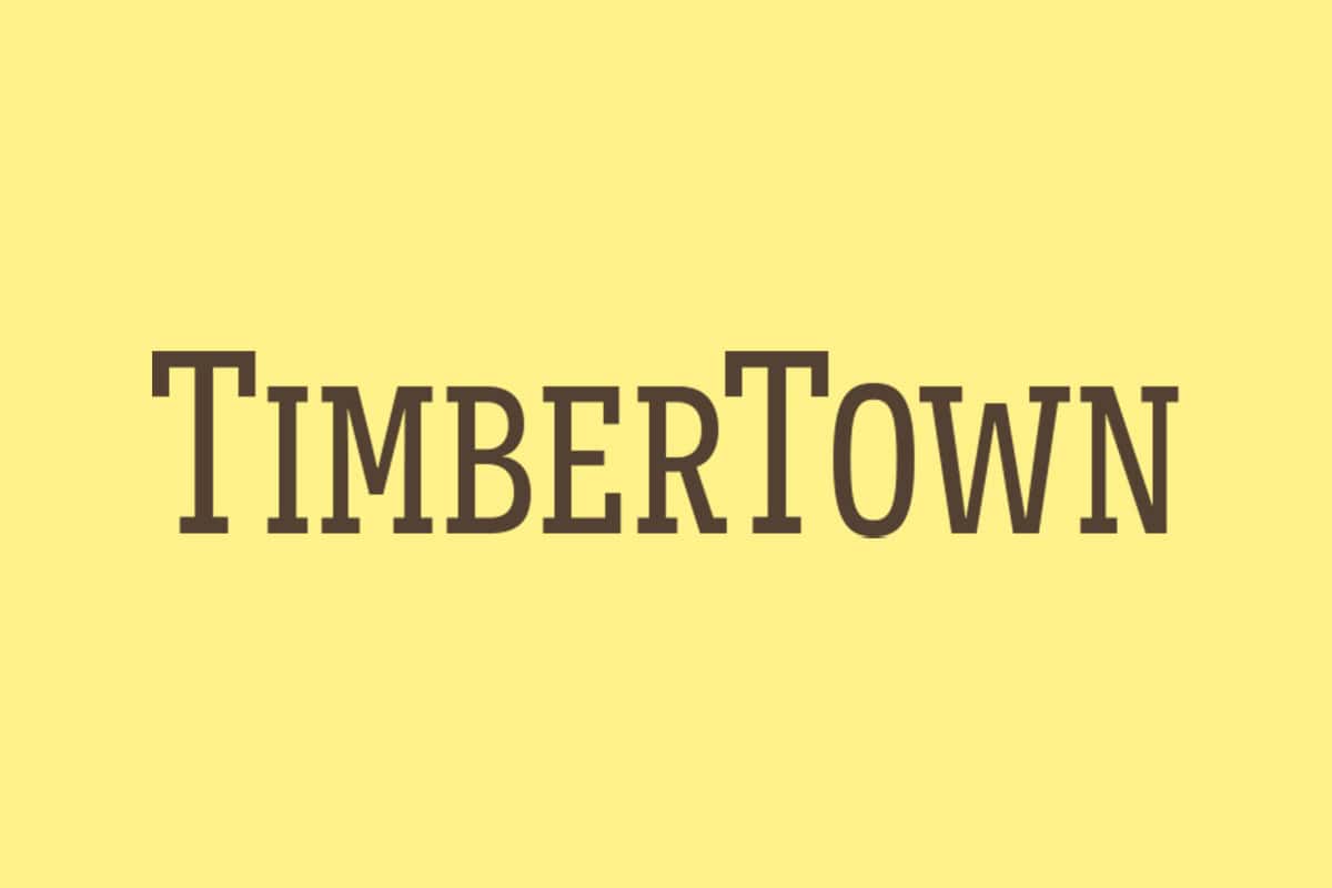 TimberTown logo on a yellow background, representing a trusted brand for composite decking in outdoor construction projects.