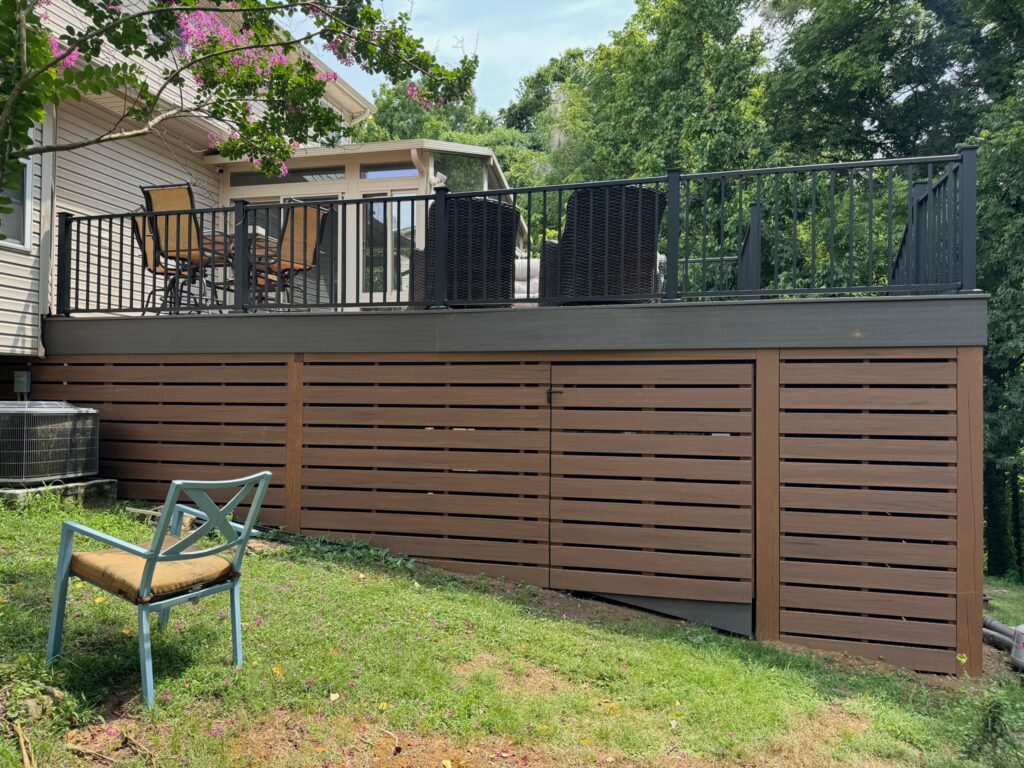 Deck with stylish railing and outdoor seating, showcasing a custom outdoor living space designed by DW Construction in Nashville, TN.